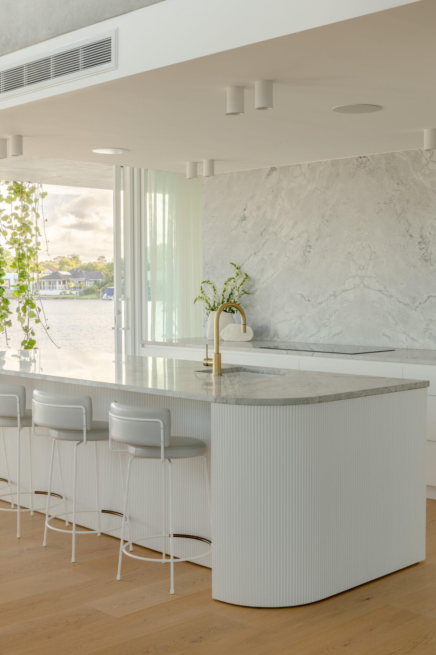 Mermaid, Noosa – Superwhite Dolomite and Arabescato Marble interior, image 1 of 9